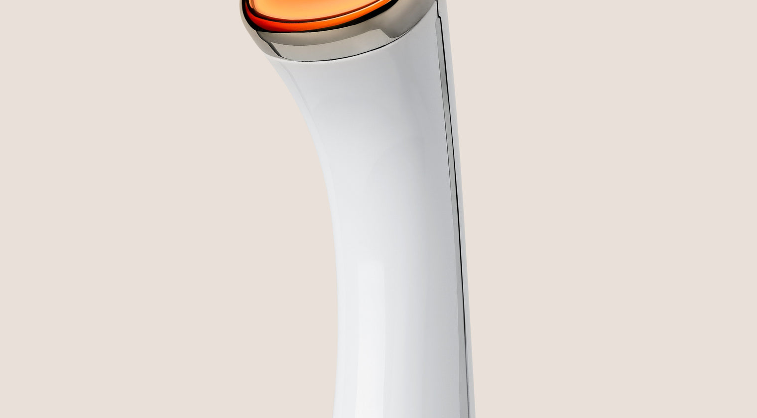 La tête lumineuse orange du Time Control 7+ de Talika, en gros plan sur fond beige