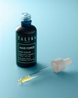 Sérum Hair Force Talika, flacon ouvert et pipette remplie de phyto-sérum
